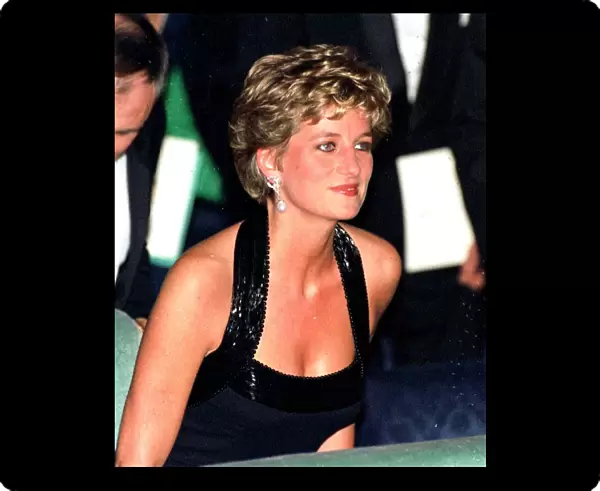 Princess Diana arrives for a UNESCO charity dinner at the Palace of Versailles near Paris