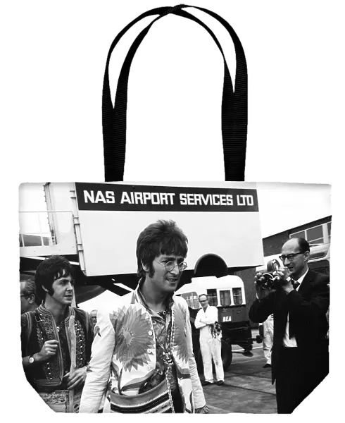 The Beatles 1967 John Lennon and Paul McCartney arriving at Heathrow Airport
