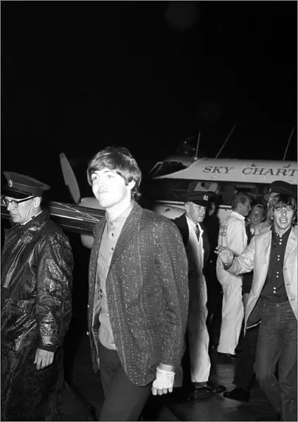 The Beatles l-r: Paul McCartney, Ringo Starr and John Lennon arrive at Blackpool