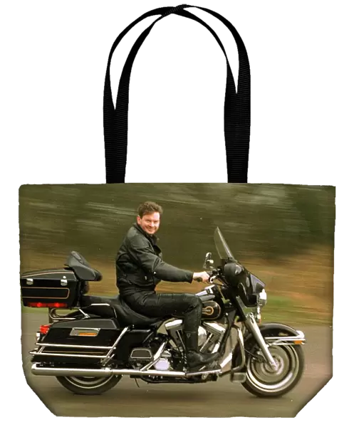 John Gordon Sinclair actor riding his Harley Davidson Electra Glide motorcycle