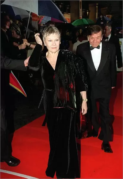 Dame Judi Dench actress and Michael Williams actor at the BAFTA Awards April 1998