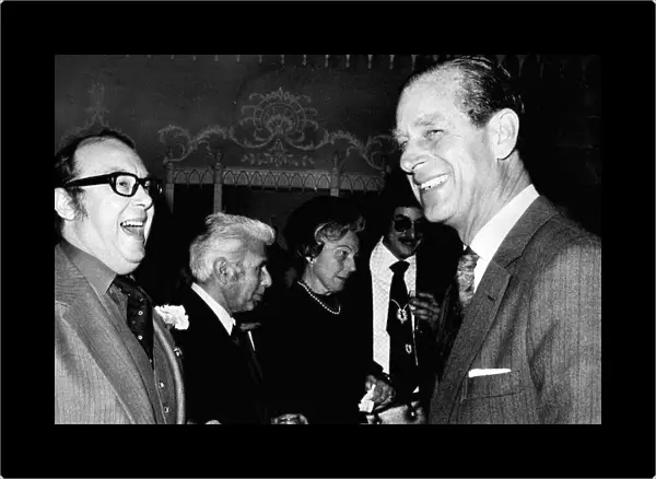 Prince Philip, the Duke of Edinburgh, with comedian Eric Morecambe at a Variety Club
