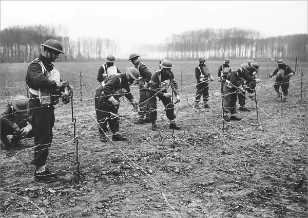 The Royal Scots lay barbed defences during WW2 1940