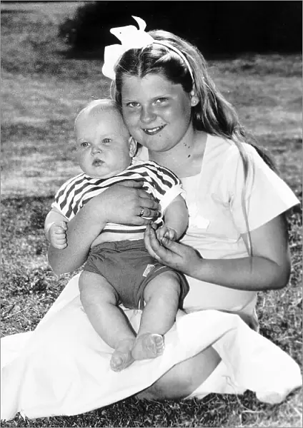 Louise Brown Test Tube Girl holding 6 month old Andrew Machea on her lap May 1989