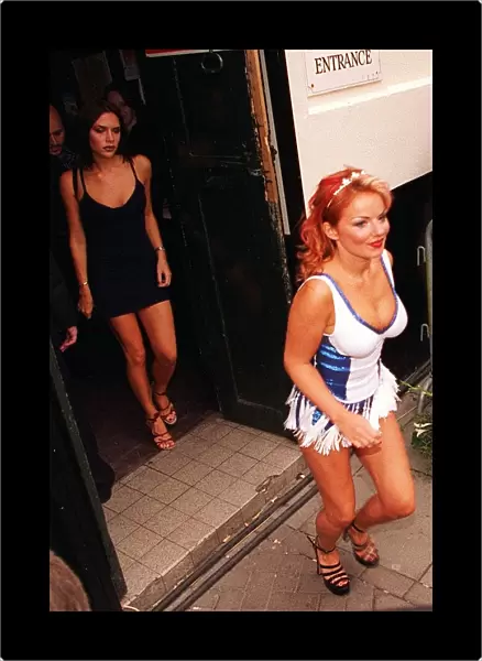 Members of Pop Group Spice Girls Victoria Adams and Geri Halliwell leaving the theatre