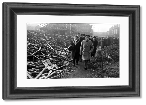 King George VI visits Birmingham to survey the bomb damage after a bombing raid in world