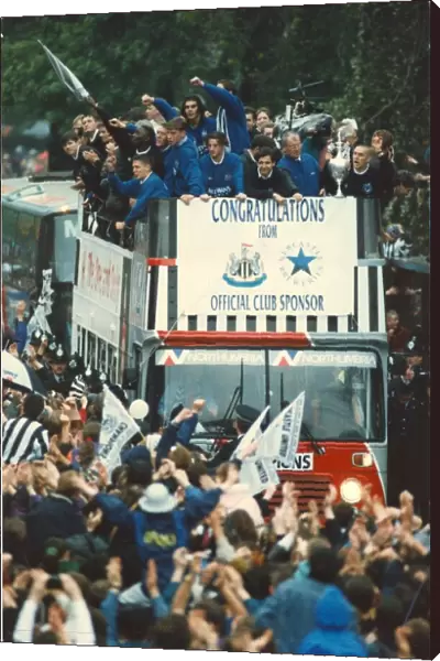 Newcastle United win the First Division - Players on the open top bus with the trophy May