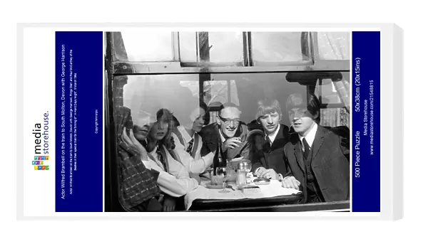 Actor Wilfred Brambell on the train to South Molton, Devon with George Harrison