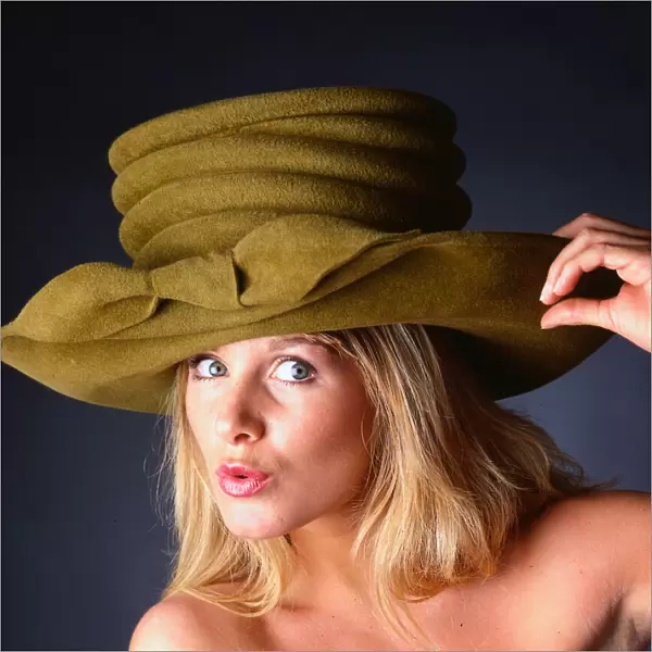 Hat Fashion model wears green felt hat, November 1989