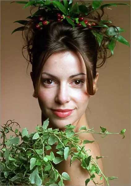 Seasons looks - autumn fashion Model Lisa McGuigan with greenery