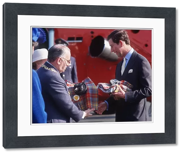 Prince Charles receiving a kilt from Lord Provost Robert Gray at the Glasgow Garden