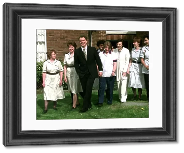 Tony Blair and wife Cherie with nurses in Derby during election campaign
