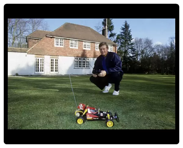 Sandy Lyle playing with remote control car April 1988