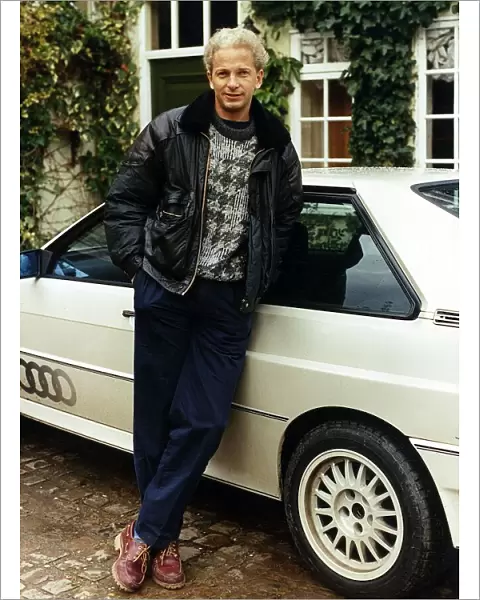 David Gower ex England Player standing beside white Audi Quatro dbase