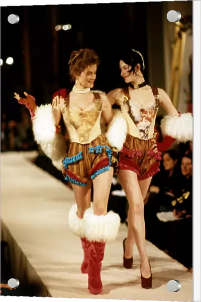 Model on the cat walk moddeling Vivienne Westwood designs at a fashion show waspies