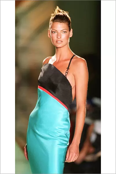 Linda Evangelista models for Versace at Paris fashion show on catwalk wearing blue