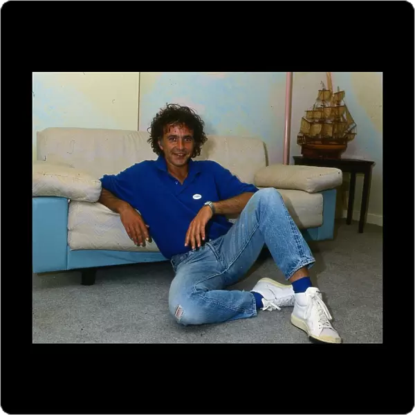 David Essex, September 1987 Sitting on the floor leaning against a sofa wearing