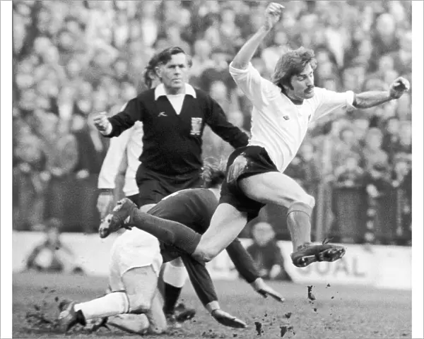Steve Heighway of Liverpool flies through air March 1975 after a tackle by Peter
