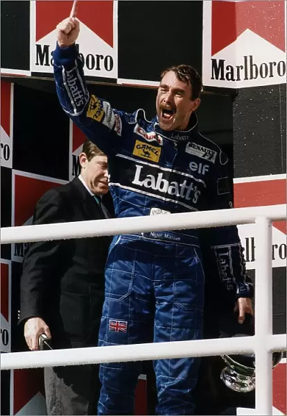 Nigel Mansell Motor Racing Formula One Grand Prix Driver for Williams Renault walks on to