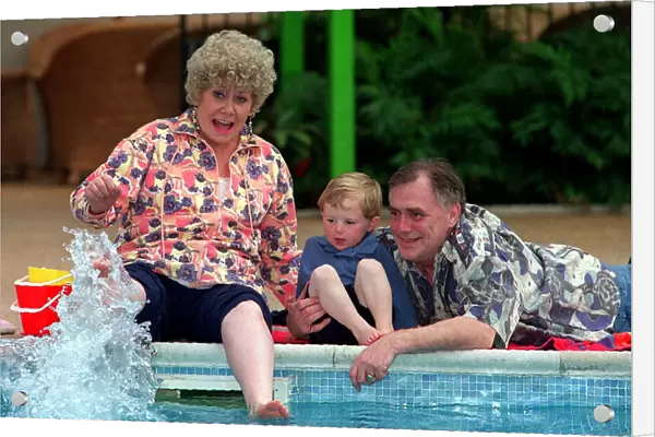 Liz Dawn and William Tarmey as Vera and Jack Duckwort with grandson Tommy Coronation