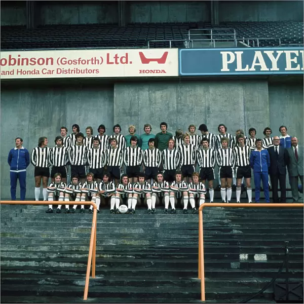 Newcastle Squad and backroom staff gather on the grandstand at St James for a team