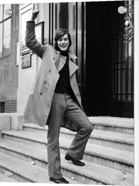 Peter Marinello signs for Arsenal. Peter Marinello gives the thumb-up on his arrival at