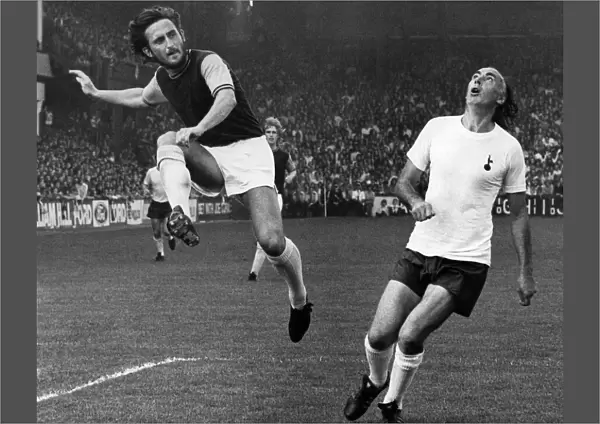 W. Ham v Spurs. Lampard puts over a centre leaving Gilzean gasping