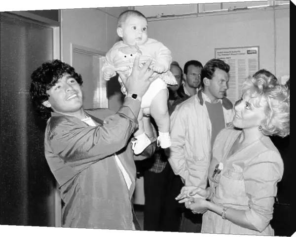 Oh Baby. Diego Maradona and girlfriend, Caludia show off daughter Dalma