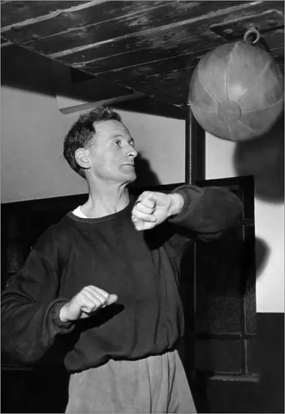 Tom Finney putting the punch into things. December 1959 P012590