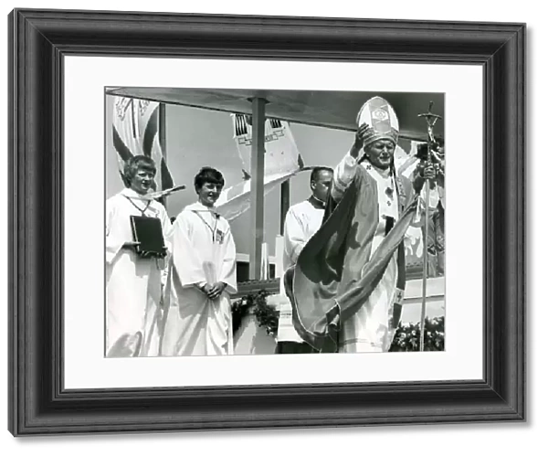 Pope John Paull II visited Coventry. The Holy Father at Baginton airport giving