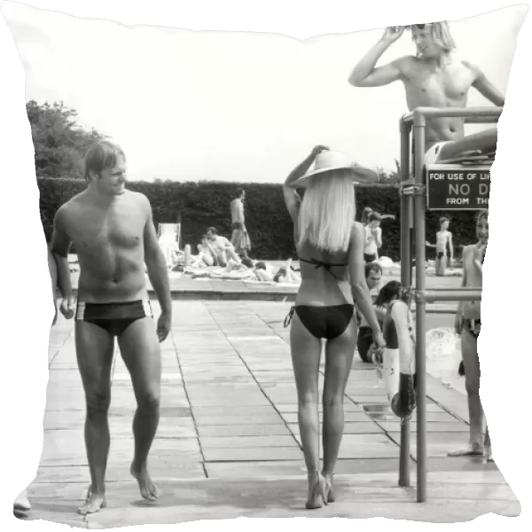 Blond model Rita Pennington causes heads to turn as she walks around Finchley swimming