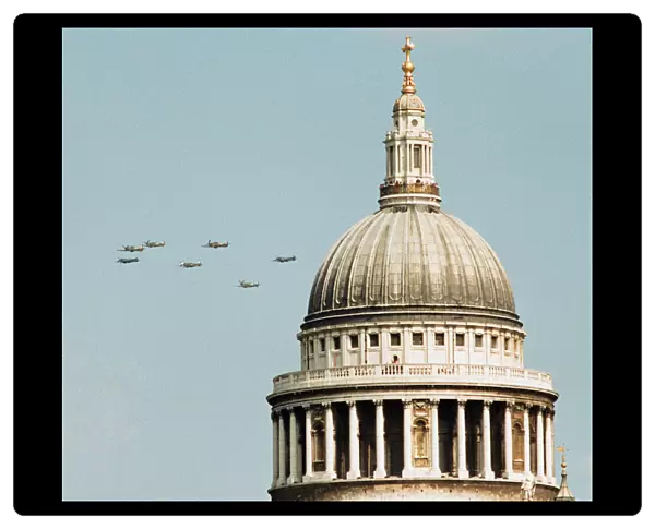 Spitfires and Hurricanes seen here passing the dome of St Paul