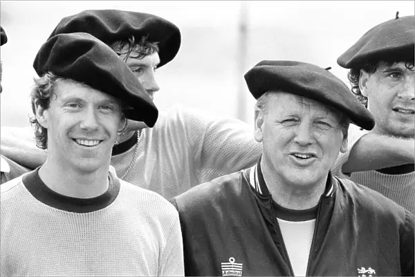 England footballer Tony Woodcock (left) and manager Ron Greenwood in relaxed mood wearing