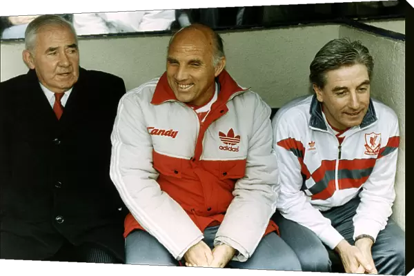 Ronnie Moran Liverpool FC manager sits on the bench with Roy Evans (right