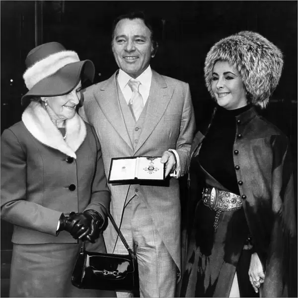 Mrs James, Richard Burton and Elizabeth Taylor with the C. B. E. at the Dorchester Hotel, W