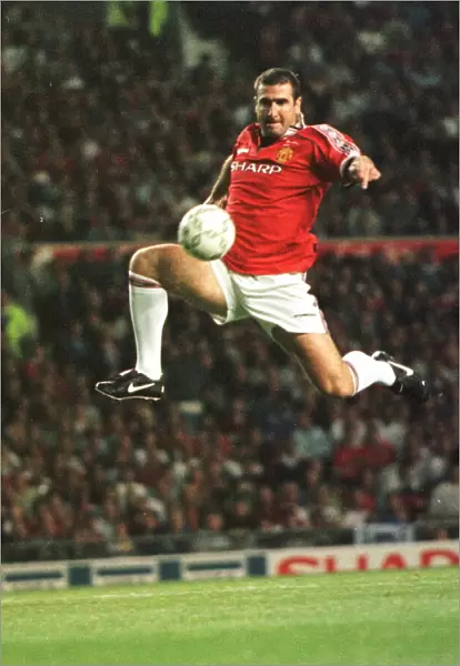 Eric Cantona jumping to control a ball Aug 1998