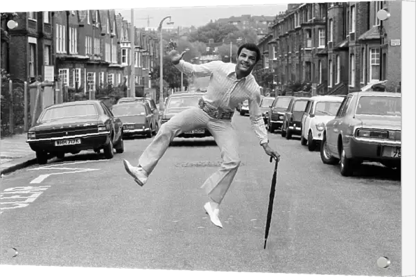 John Conteh celebrates after winning both British and European Commonwealth titles in his