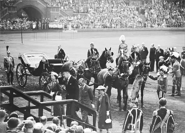 King Gustaf VI of Sweden and Queen Elizabeth II seen here arriving at the Olympic Stadium