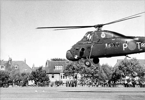 A Royal Navy Westland Wessex helicopter gives a demonstration to the pupils of Monkseaton
