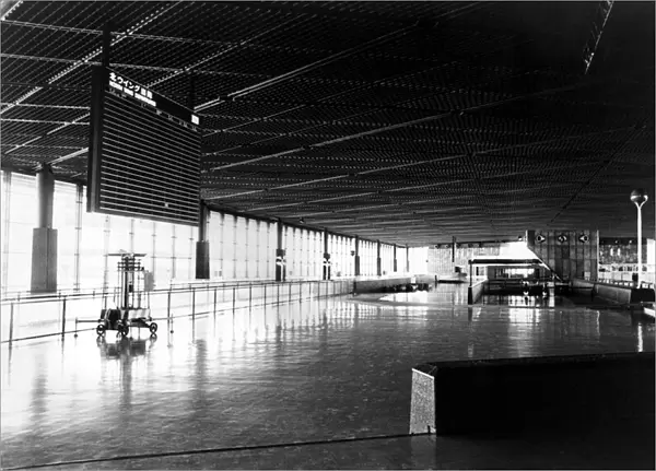 The picture shows the deserted passenger terminal at Narita Airport, Tokyo, Japan