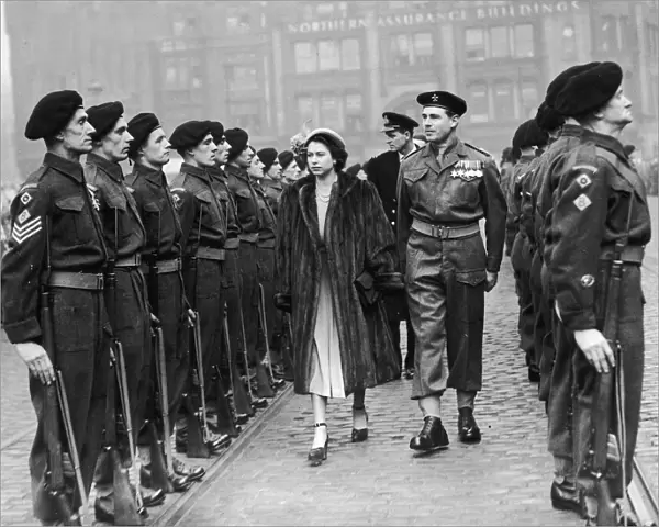 The Queen visits Manchester. Princess Elzabeth conducts an inspection of the guard in