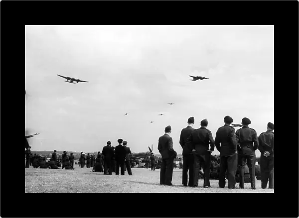 A demonstration by Mosquito fighters and Mustangs during an air display at a Royal