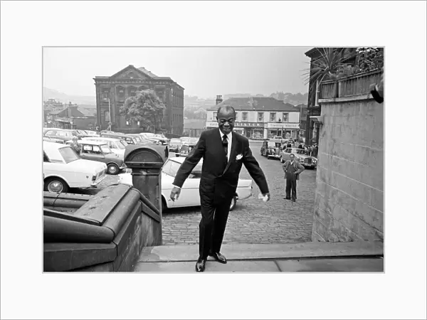 Louis Armstrong seen observing an old Batley tradition. Touching the Yorkshire Mills
