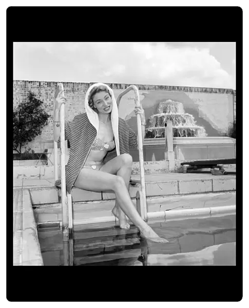 Jane Regan modelling the latest beachwear and swimming costume fashions at the local Lido