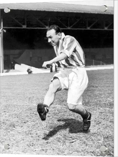 West Bromwich Albion footballer Billy Elliott pictured during training. Circa 1950