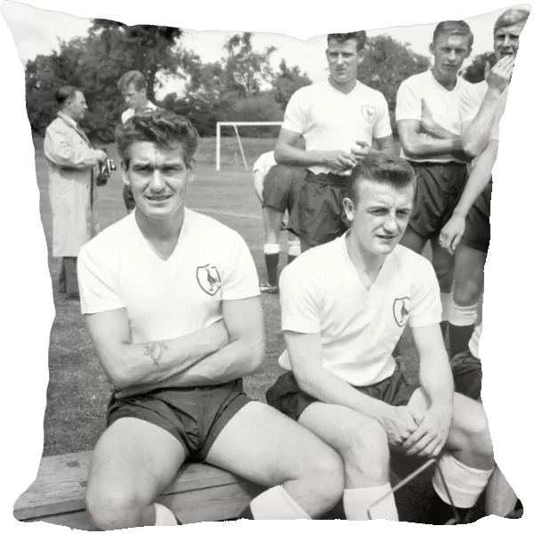 Tottenham Hotspur footballers Ron Henry (left) and Terry Dyson pose for photgraphers at