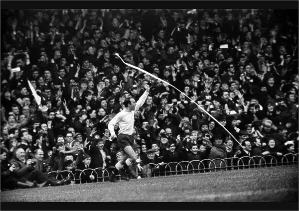 Jimmy Greaves celebrates after scoring a goal for Tottenham Hotspur only for it to be