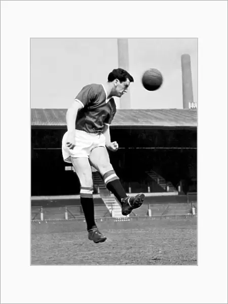 Manchester United footballer Tommy Taylor in heading practice at Old Trafford, circa 1957