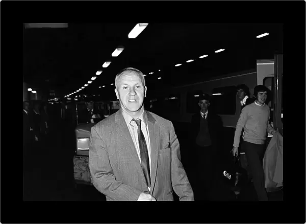 Liverpool manager Bill Shankly arrives at Euston Station