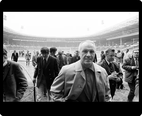 Liverpool manager Bill Shankly at Wembley Stadium to inspect the pitch ahead of his
